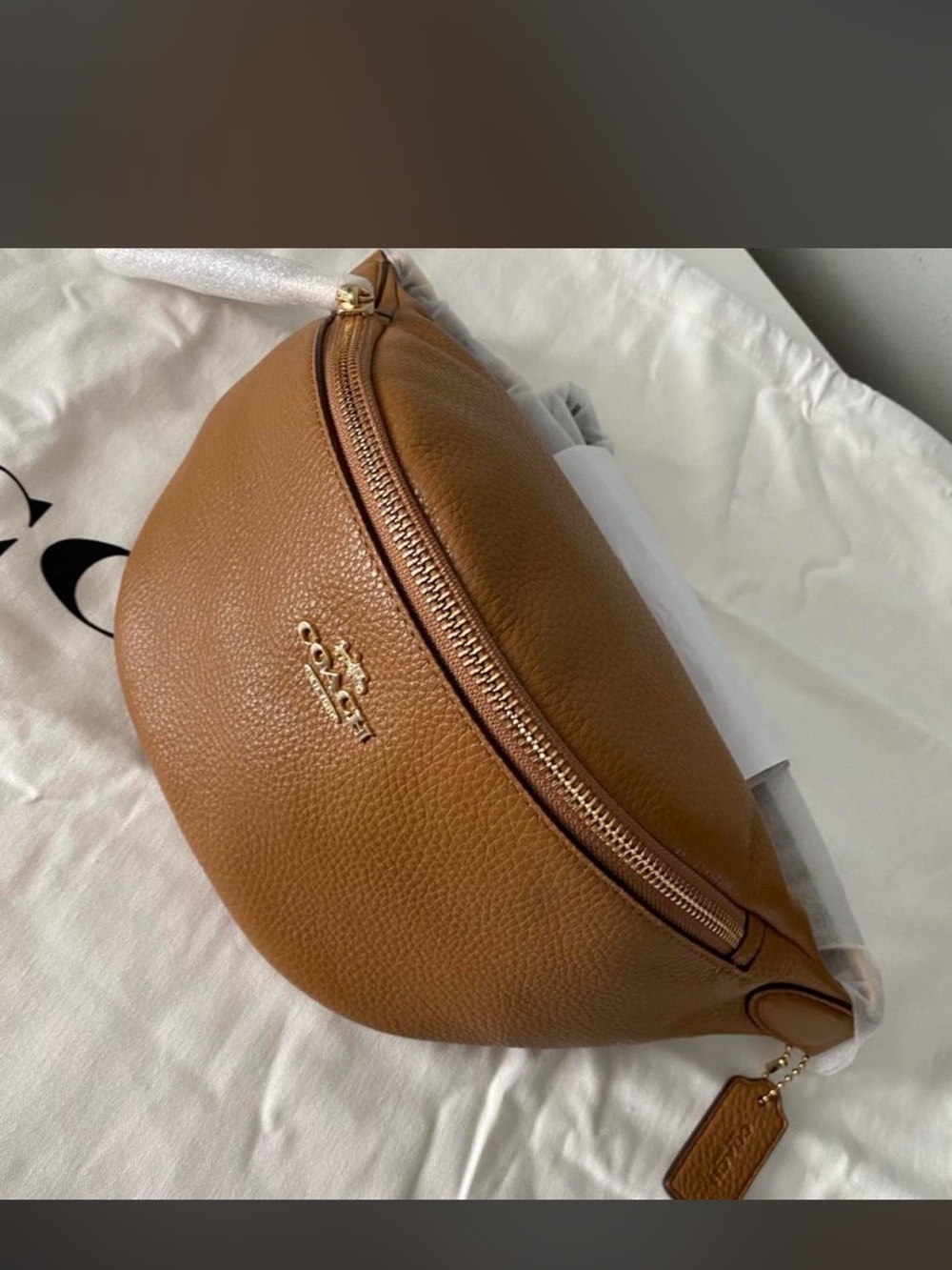Coach Pebbled Leather Crossbody Belt Bag in honey brown